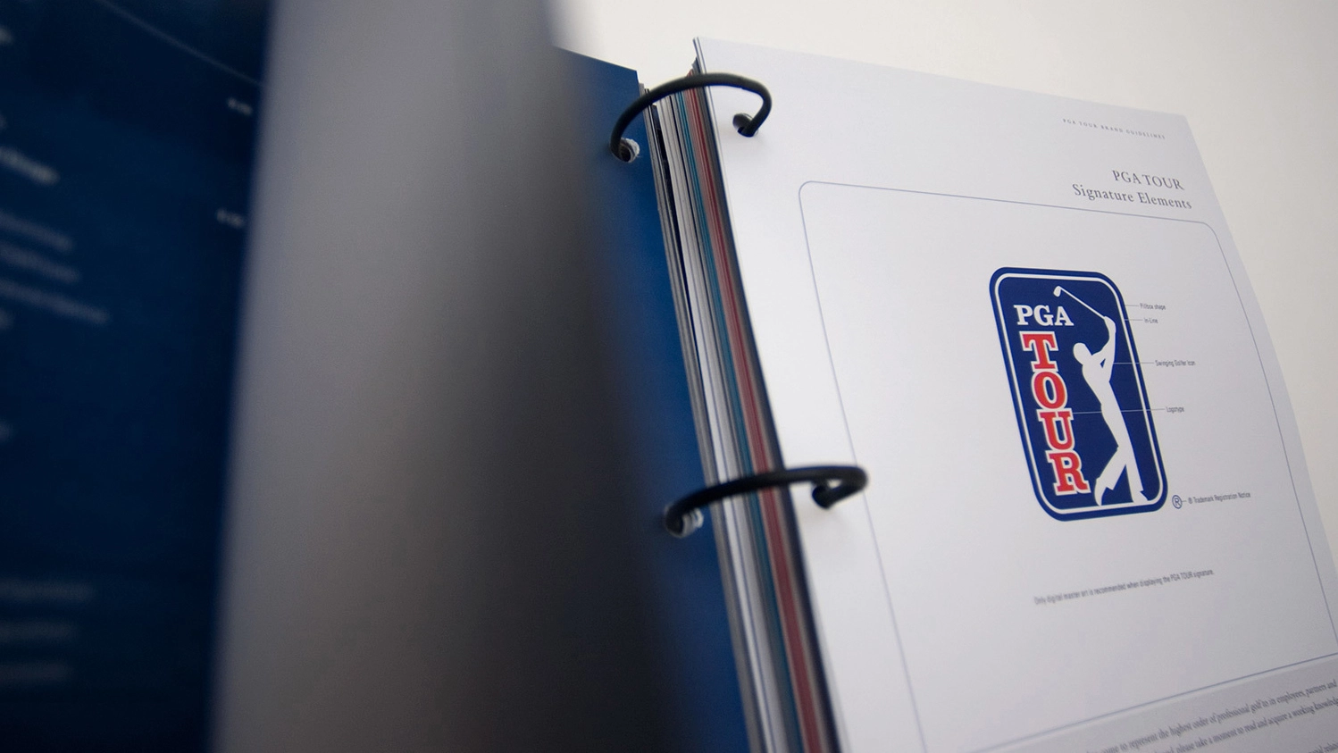 Closeup of the PGA Tour brand guidelines book
