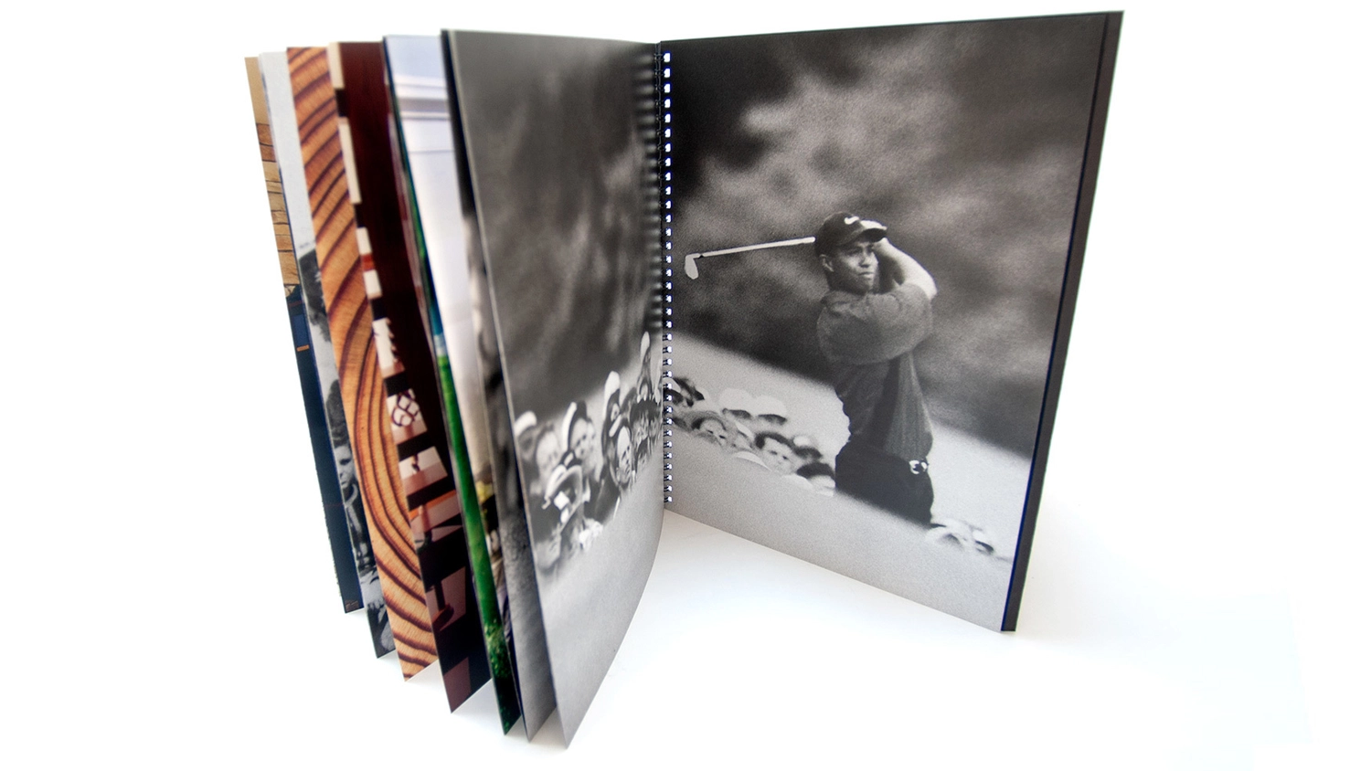 Printed brochure displaying the inside of the tour brochure featuring Tiger Woods