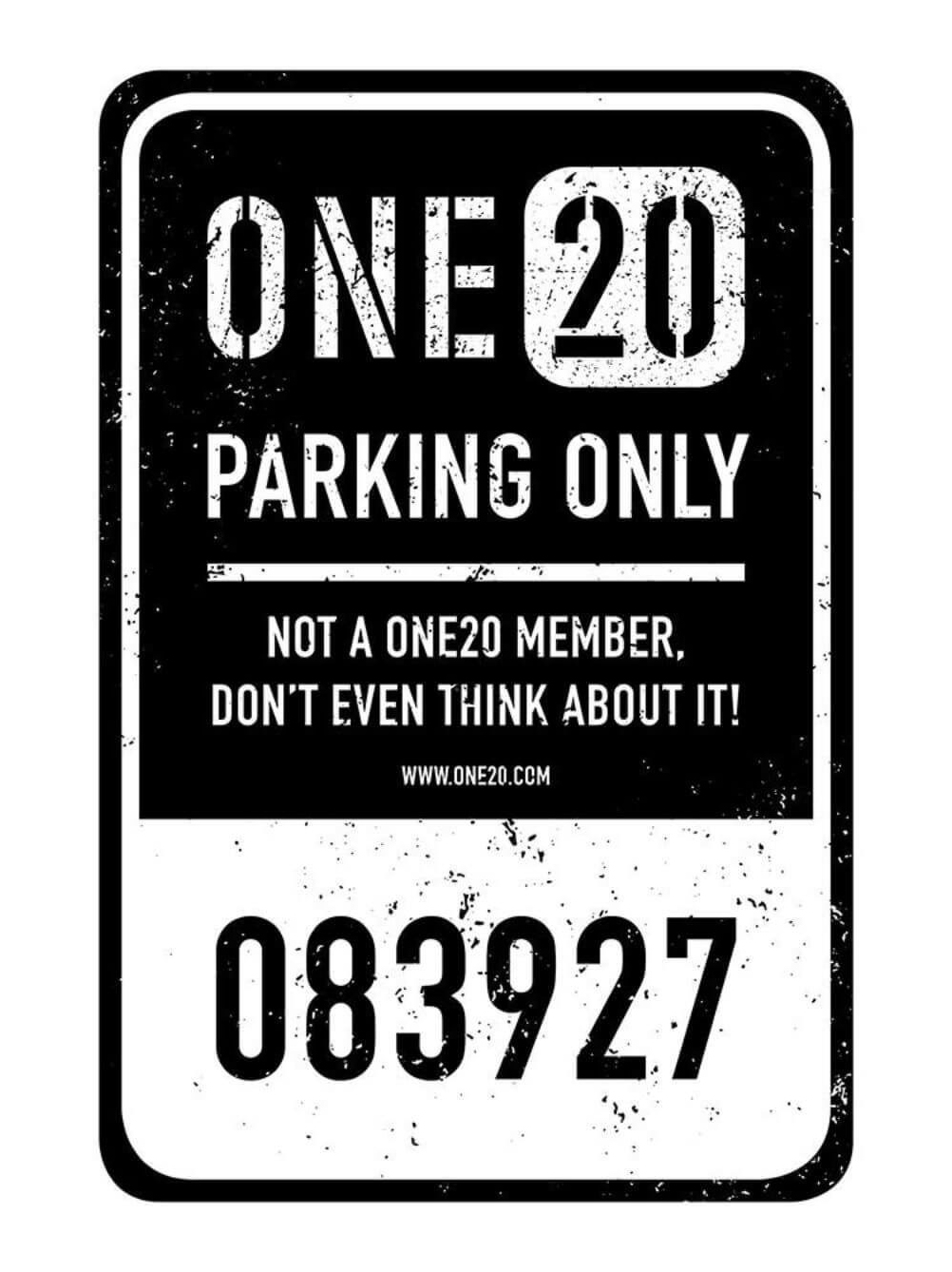 Sign reading "ONE20 Parking Only" with bold text. Includes warning "Not a ONE20 member, don't even think about it!" and number "083927" below.